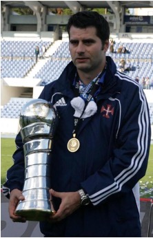 João Janeiro with trophies and medals across his coaching career